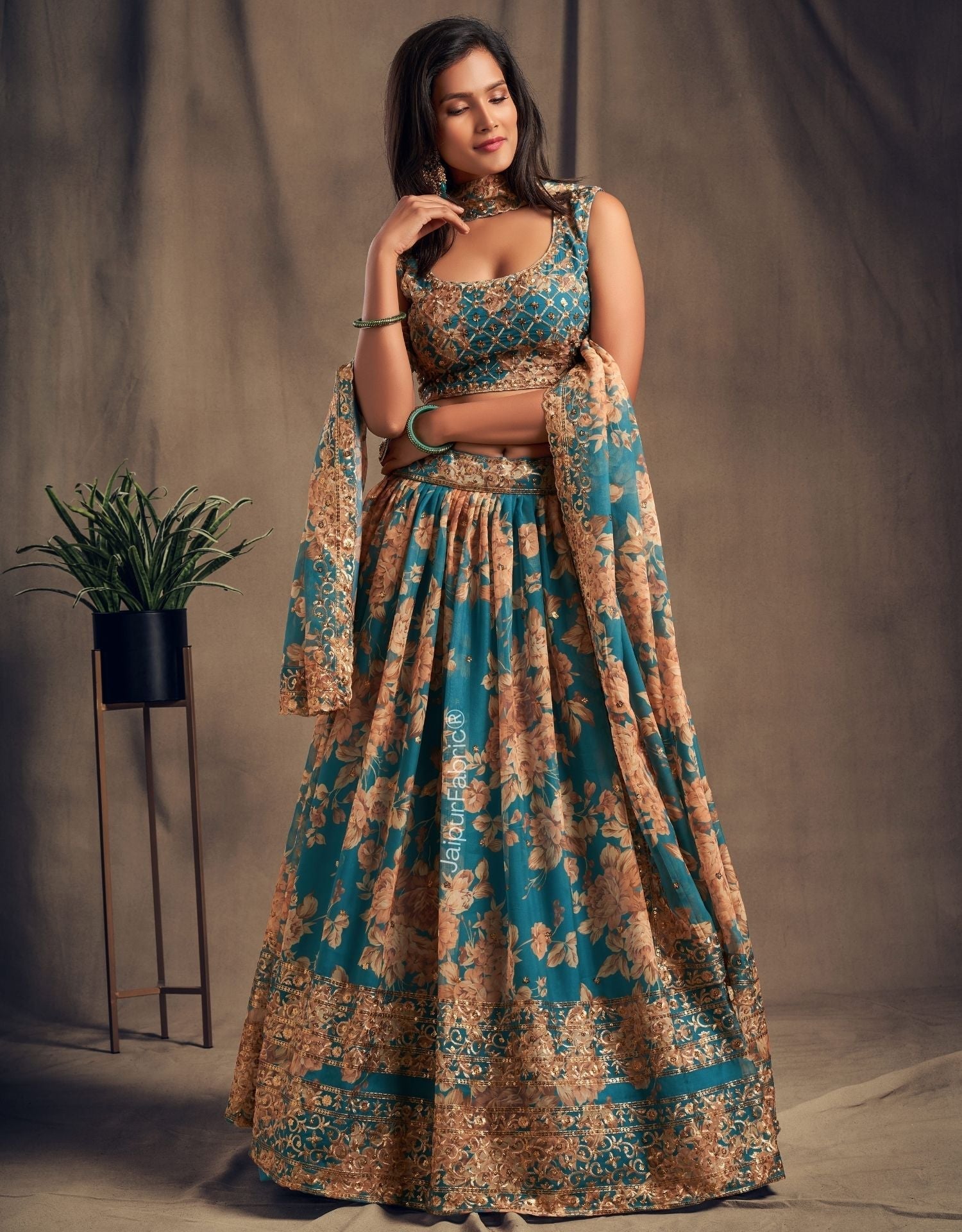 Radiant Flower Printed Teal Blue Organza Lehenga Choli