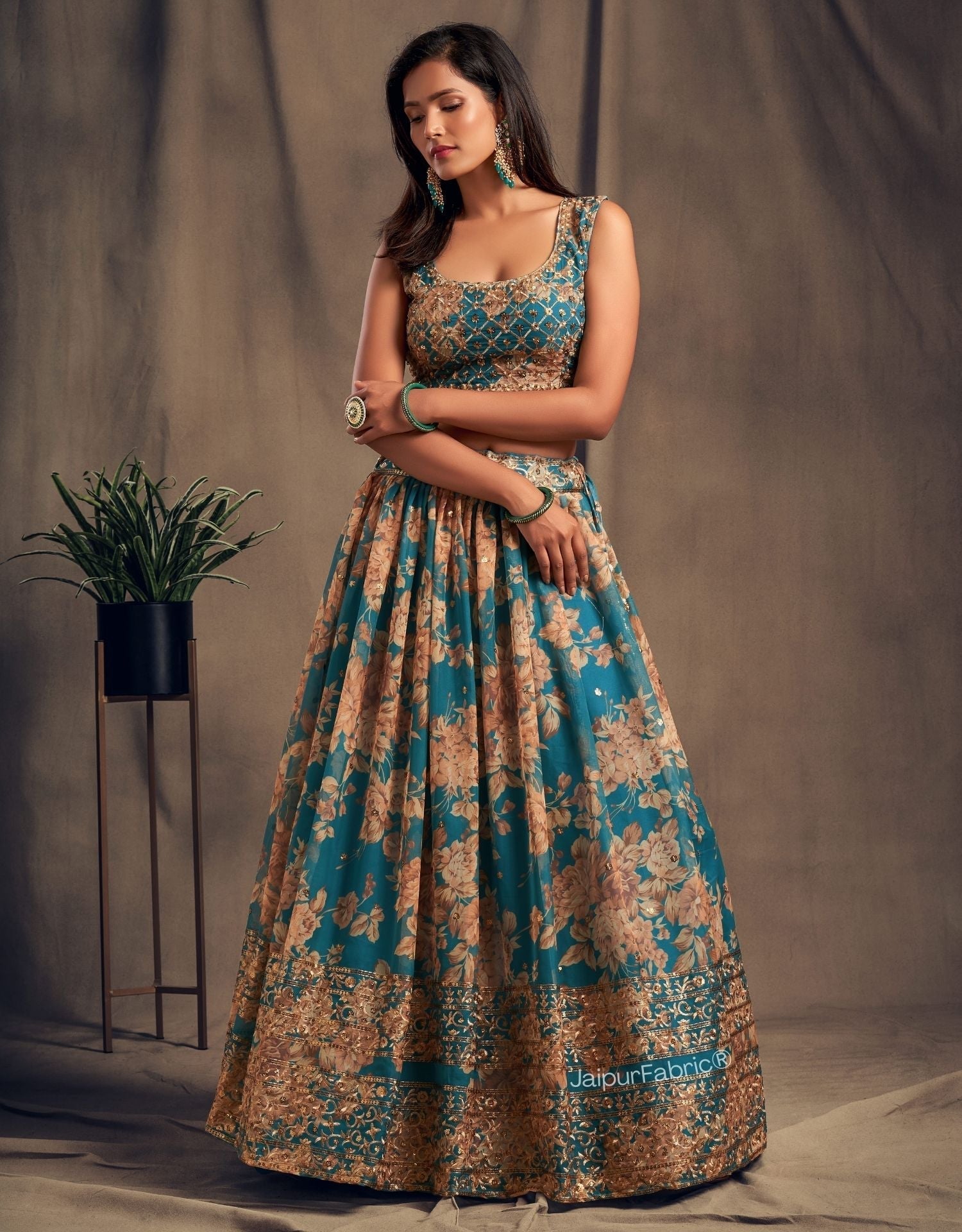 Radiant Flower Printed Teal Blue Organza Lehenga Choli