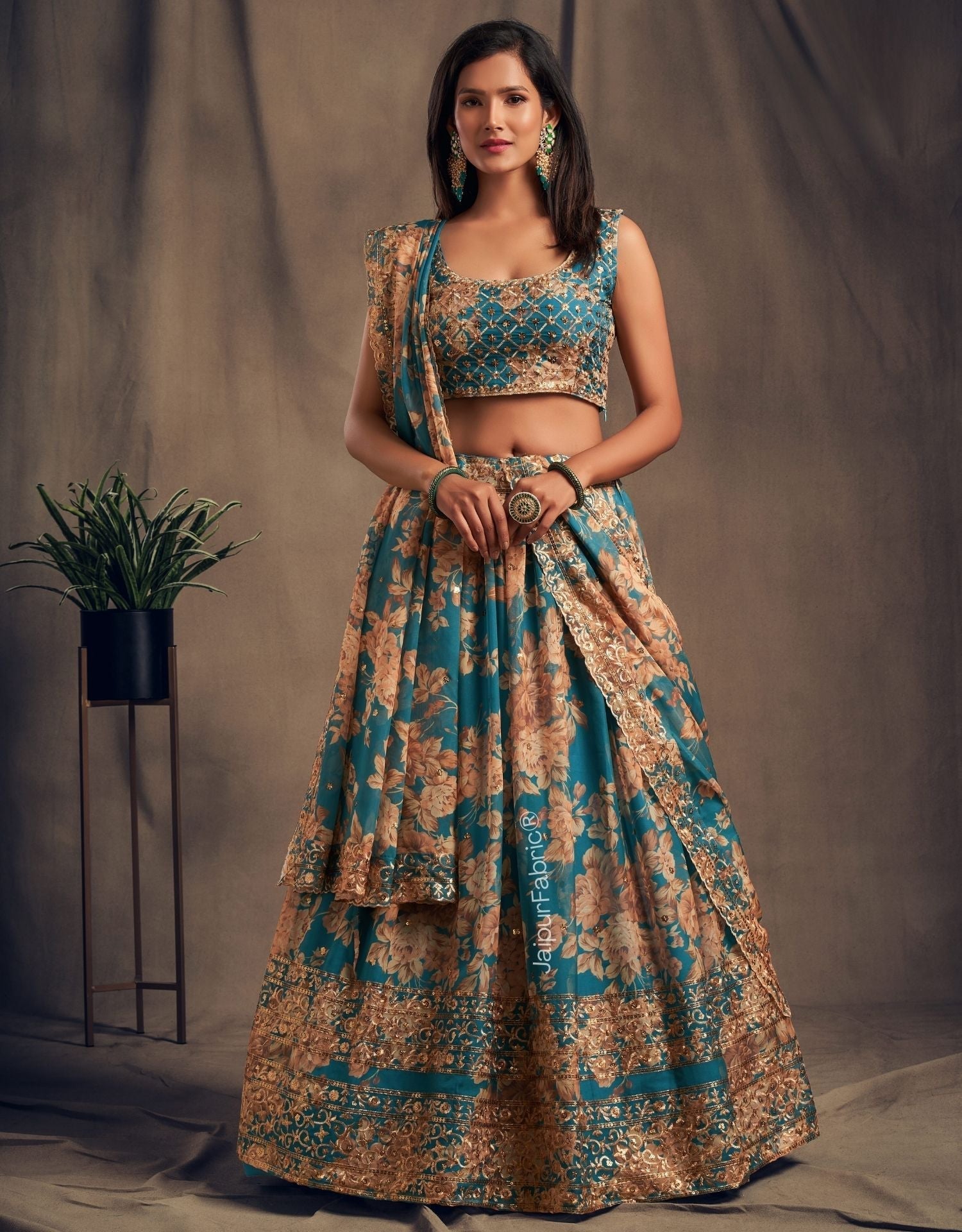 Radiant Flower Printed Teal Blue Organza Lehenga Choli