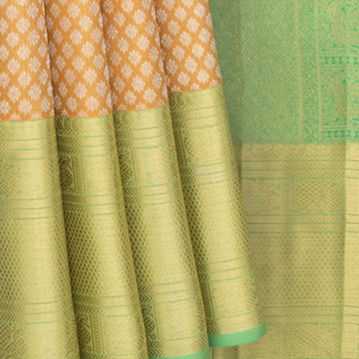 Peach Zari Handwoven Kanchipuram Korvai Silk Saree With Silver Zari Floral Motifs And Green Pallu