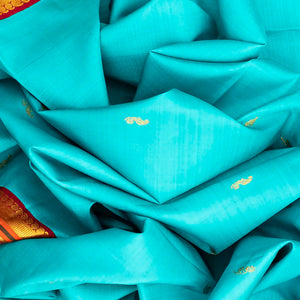 Turquoise Handloom Kanchipuram Korvai Silk Saree With Mango Buttas-Turquoise