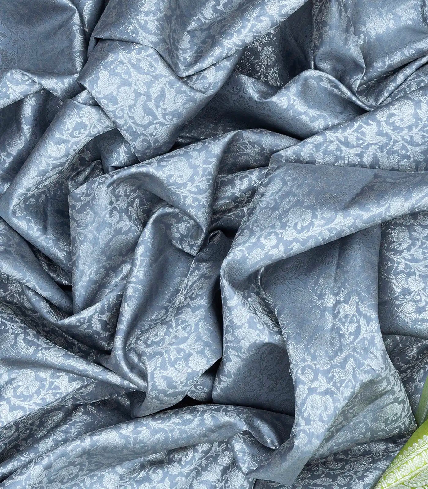 Grey  Handwoven  Kanchipuram  Silk Saree  With Floral,  Peacock,  Annam and  Elephant Motifs In Silver Zari