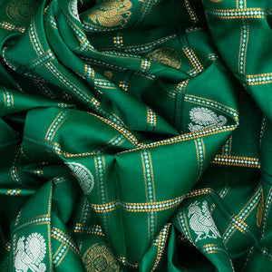 Green Handloom Kanchipuram Silk Saree With Annam Chakaram Motifs-Green