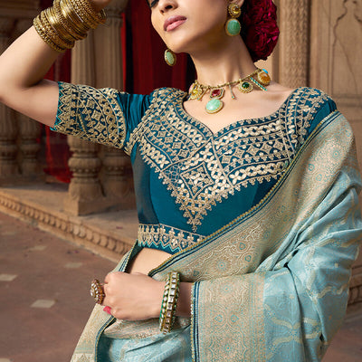 Stunning Sky Banarasi Satin Silk Saree With Energetic Blouse