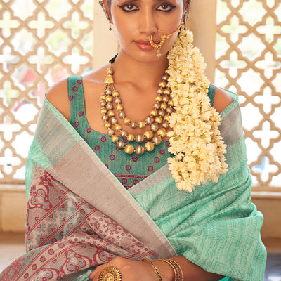 Embrocation Turquoise Cotton Silk Saree With Blooming Blouse Piece