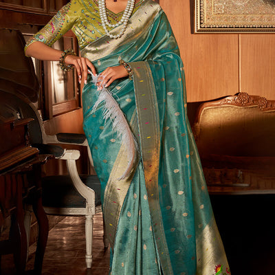 Splendorous Turquoise Paithani Silk Saree With Appealing Blouse Piece