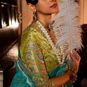 Splendorous Turquoise Paithani Silk Saree With Appealing Blouse Piece