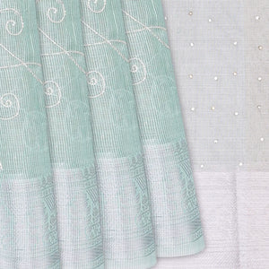 Mint Green Woven Linen Saree With Embroidered Floral Motifs-Mint Green