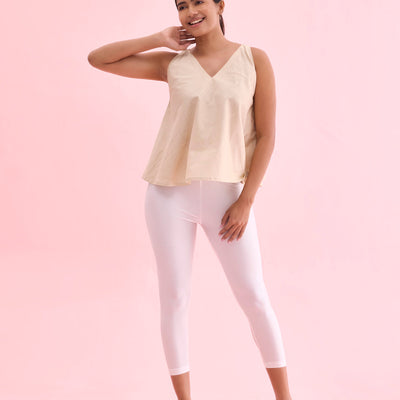 Women Solid White Shimmer Cropped Leggings