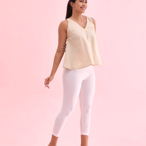 Women Solid White Shimmer Cropped Leggings