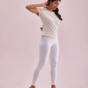 Women Solid Cream Ribbed Leggings