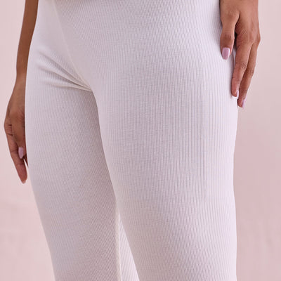 Women Solid Cream Ribbed Leggings