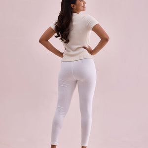 Women Solid Cream Ribbed Leggings