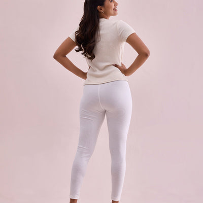 Women Solid Cream Ribbed Leggings