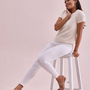 Women Solid Cream Ribbed Leggings