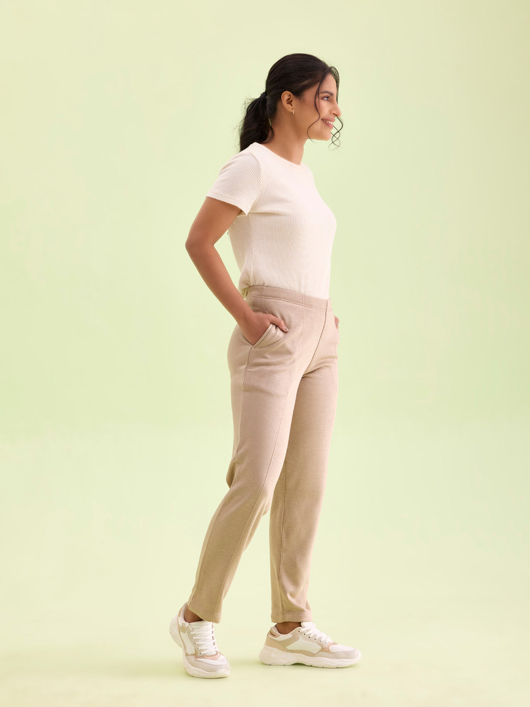 Women Solid Beige Mid Rise Ultra Warm Kurti Pant