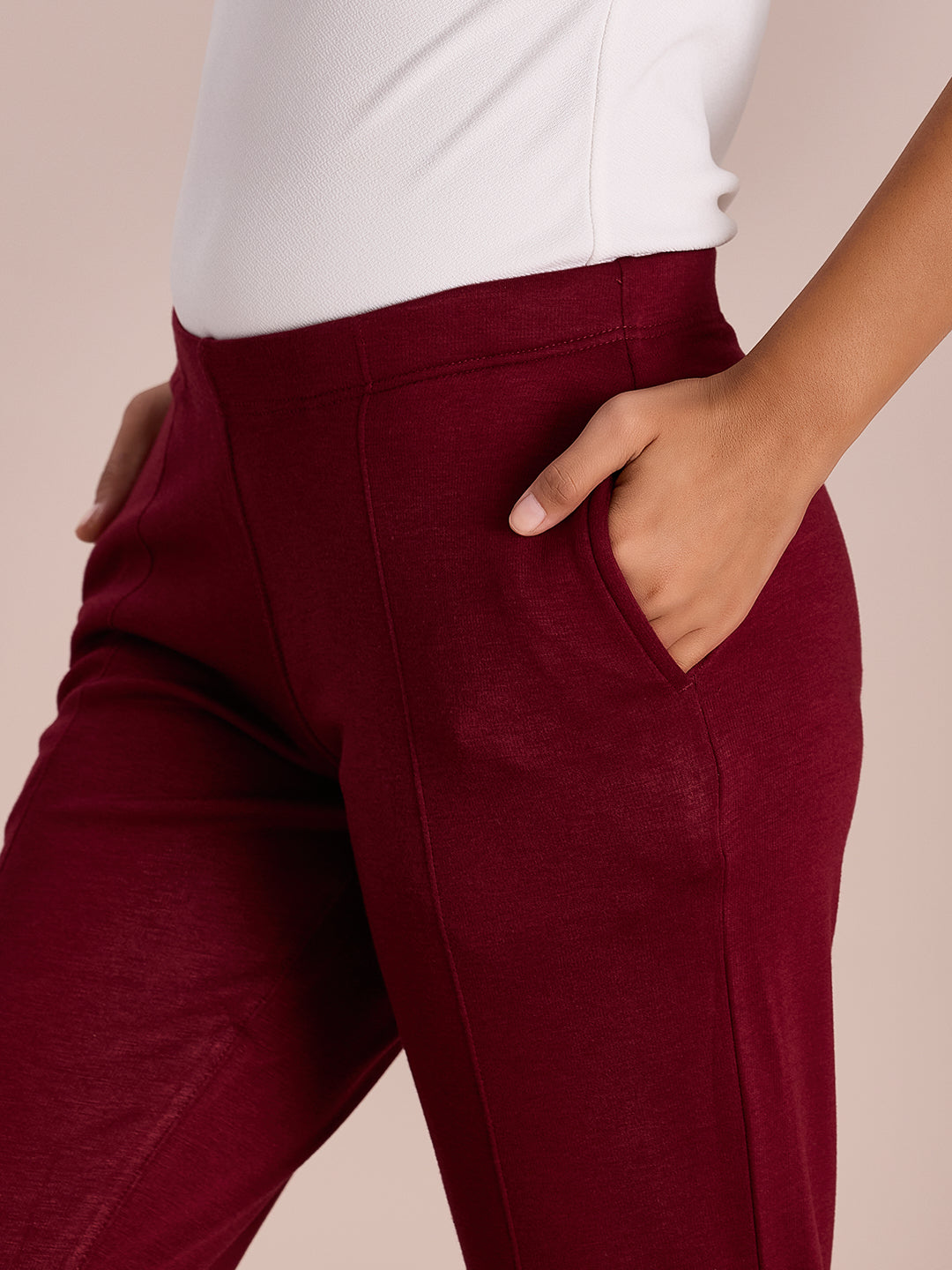 Women Solid Maroon Mid Rise Ultra Warm Kurti Pant