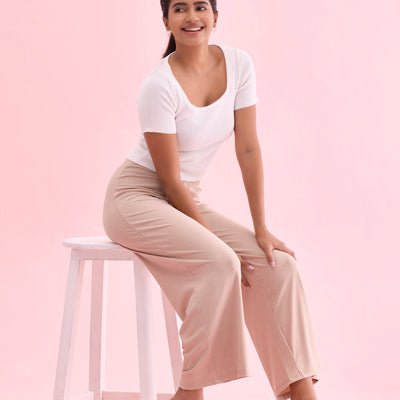 Women Solid Beige Mid Rise Ribbed Palazzos