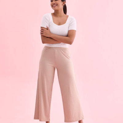 Women Solid Beige Mid Rise Ribbed Palazzos
