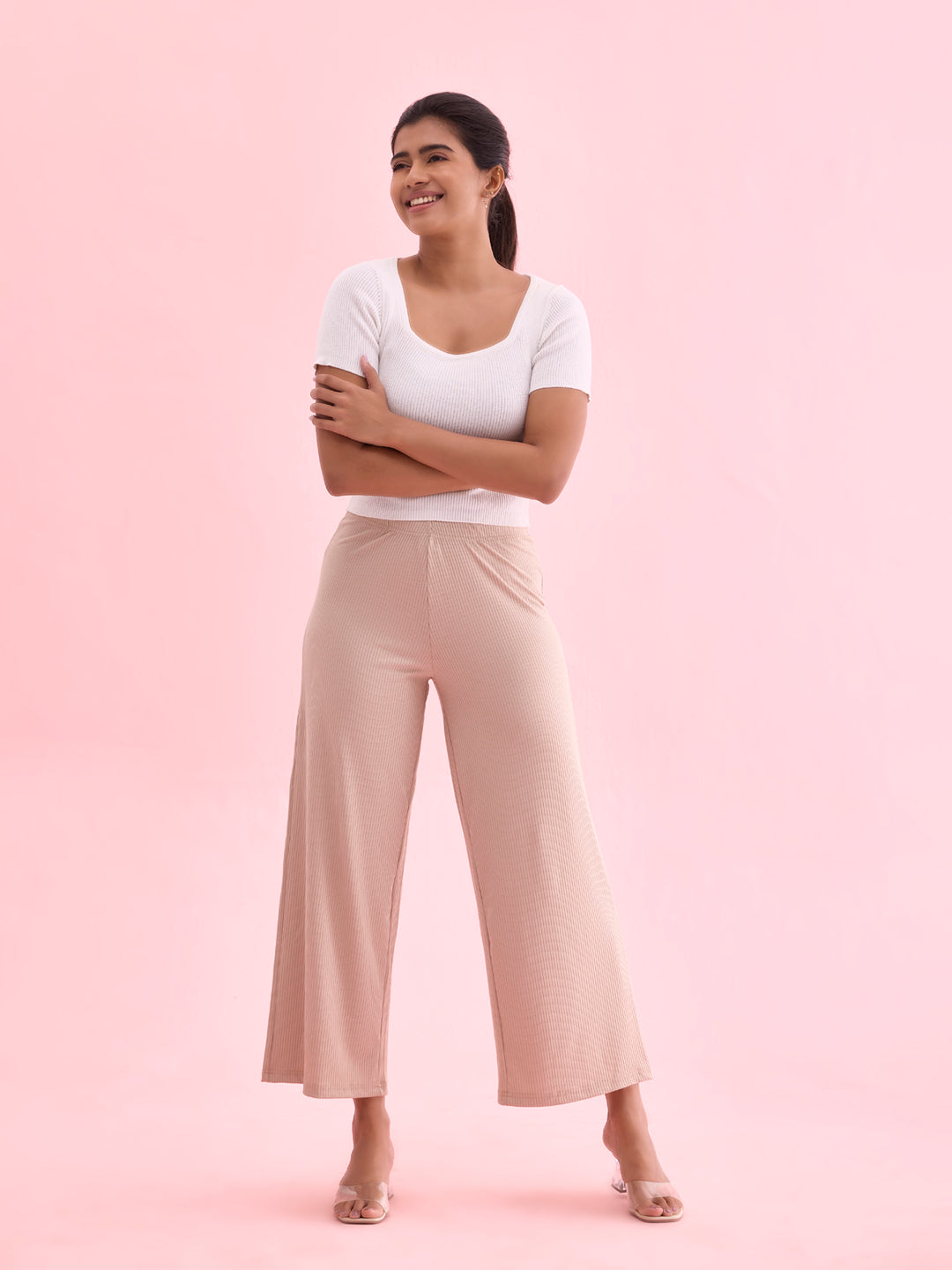 Women Solid Beige Mid Rise Ribbed Palazzos