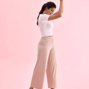 Women Solid Beige Mid Rise Ribbed Palazzos