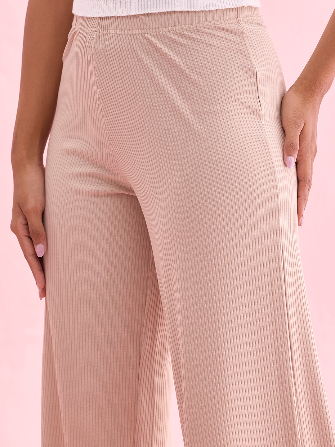 Women Solid Beige Mid Rise Ribbed Palazzos