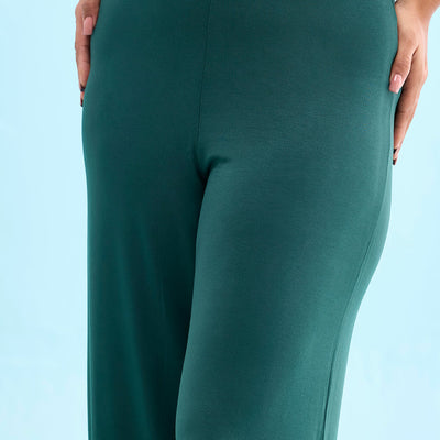 Women Solid Dark Green Knit Viscose Mid Rise Palazzos