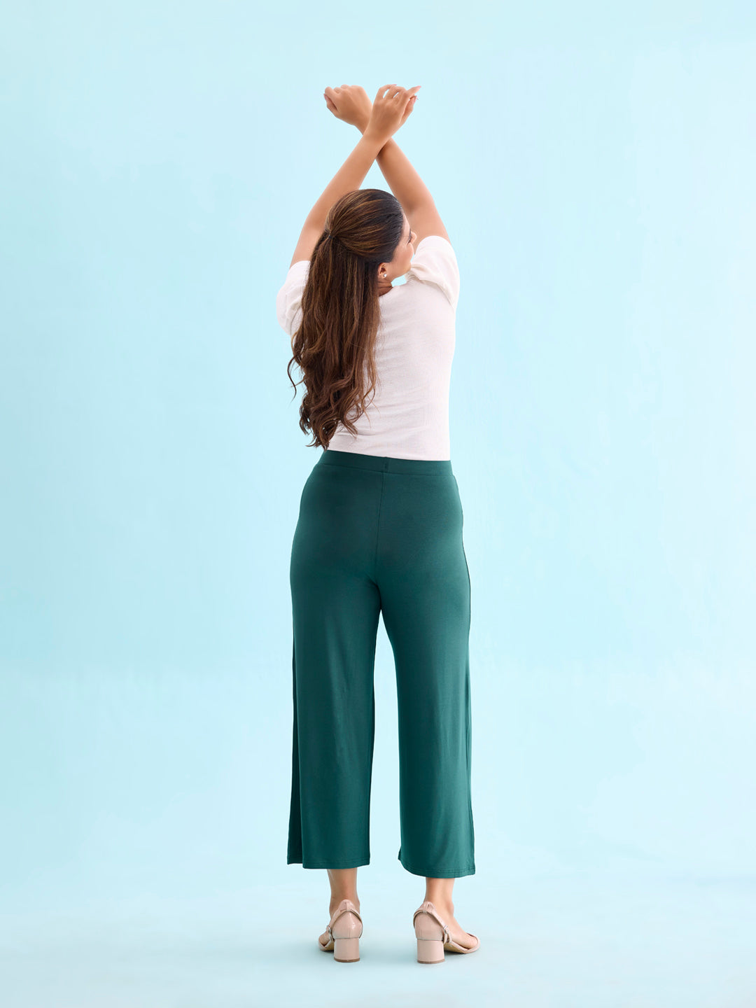 Women Solid Dark Green Knit Viscose Mid Rise Palazzos