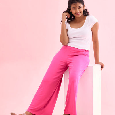 Women Solid Dark Rose Viscose Mid Rise Knit Palazzos