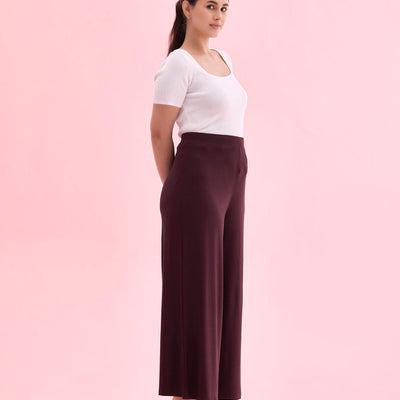 Women Solid Dark Wine Viscose Mid Rise Knit Palazzos