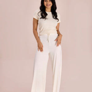 Women Solid Ecru Viscose Mid Rise Knit Palazzos