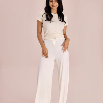 Women Solid Ecru Viscose Mid Rise Knit Palazzos