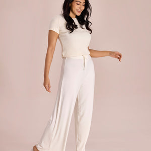 Women Solid Ecru Viscose Mid Rise Knit Palazzos