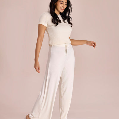 Women Solid Ecru Viscose Mid Rise Knit Palazzos