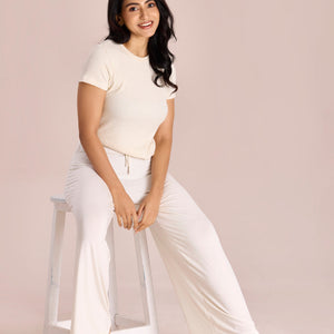 Women Solid Ecru Viscose Mid Rise Knit Palazzos