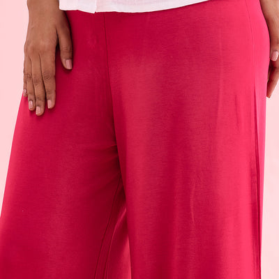 Women Solid Fuchsia Knit Viscose Mid Rise Palazzos