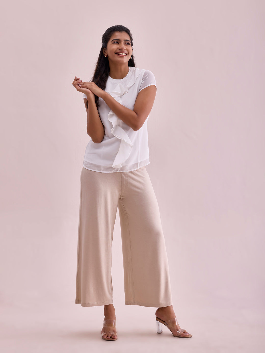 Women Solid Light Beige Viscose Mid Rise Knit Palazzos
