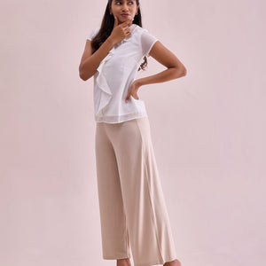Women Solid Light Beige Viscose Mid Rise Knit Palazzos