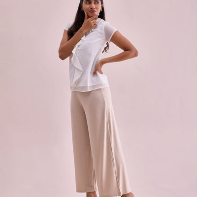 Women Solid Light Beige Viscose Mid Rise Knit Palazzos