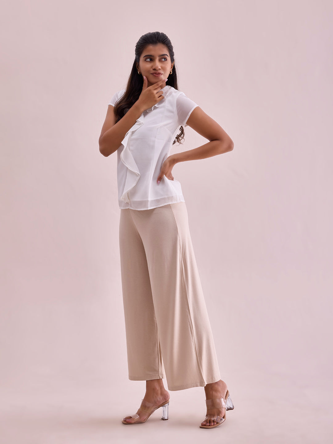 Women Solid Light Beige Viscose Mid Rise Knit Palazzos