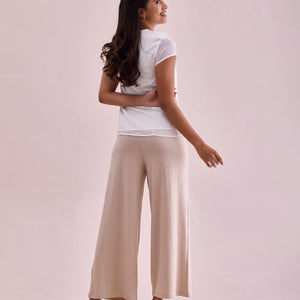 Women Solid Light Beige Viscose Mid Rise Knit Palazzos