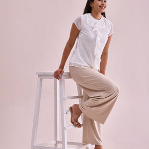 Women Solid Light Beige Viscose Mid Rise Knit Palazzos