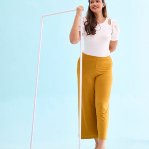 Women Solid Mustard Viscose Mid Rise Knit Palazzos