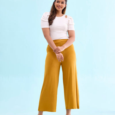 Women Solid Mustard Viscose Mid Rise Knit Palazzos