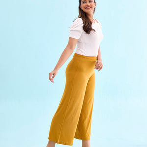 Women Solid Mustard Viscose Mid Rise Knit Palazzos