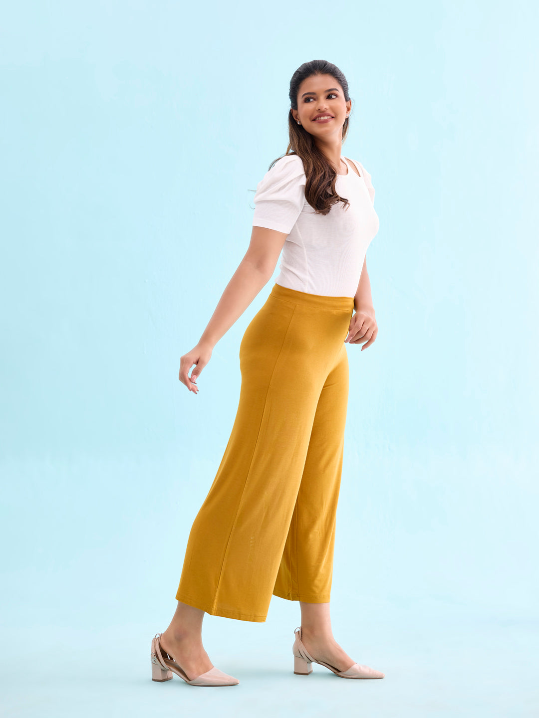Women Solid Mustard Viscose Mid Rise Knit Palazzos