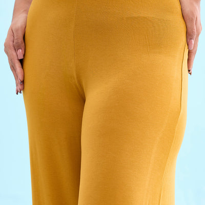 Women Solid Mustard Viscose Mid Rise Knit Palazzos