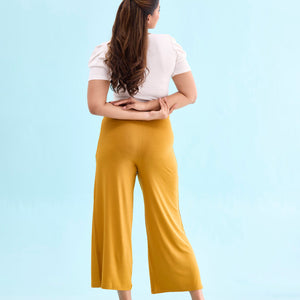 Women Solid Mustard Viscose Mid Rise Knit Palazzos