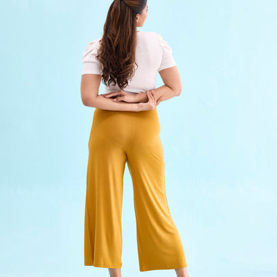 Women Solid Mustard Viscose Mid Rise Knit Palazzos