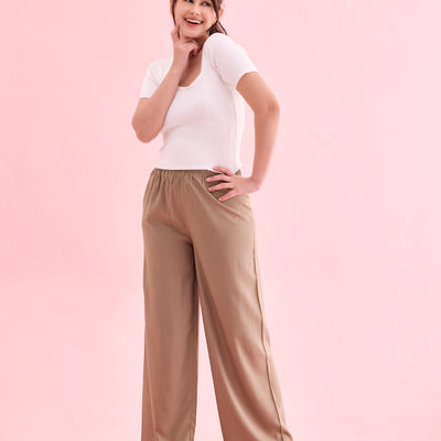Women Beige Solid Viscose Knit Mid Rise Palazzos